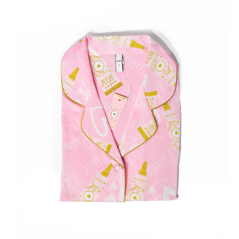 Pijama rosa para niños de P.Louise con diseño de base dorada de P.Louise