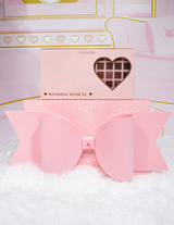 Caja de regalo con lazo rosa