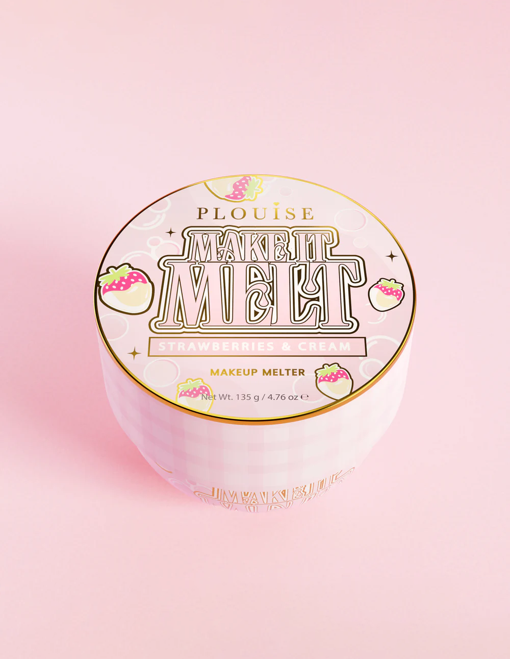 En beholder med P.Louise Make It Melt Makeup Cleansing Balmr med en pink etiket og guldaccenter på en pink baggrund