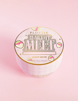 En beholder med P.Louise Make It Melt Makeup Cleansing Balmr med en pink etiket og guldaccenter på en pink baggrund