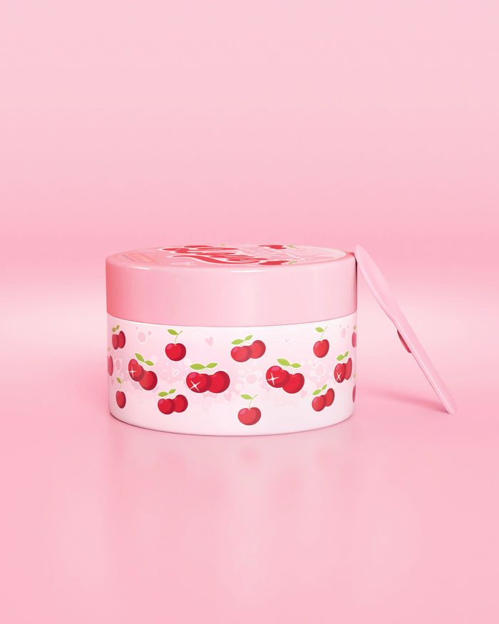 Pink beholder med kirsebærdesign på en lyserød baggrund