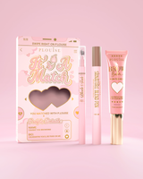 It's A Match cosmetic eyebrow set including P.Louise Signature Blend Pen, Blade & Fade Brow Pencil, and Brow Balm, packaged in pink and gold themed boxes with heart motifs.