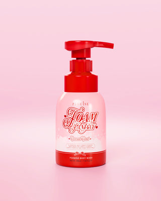 Red and pink bottle of P.Louise Foam Fantasy body wash on a pink background
