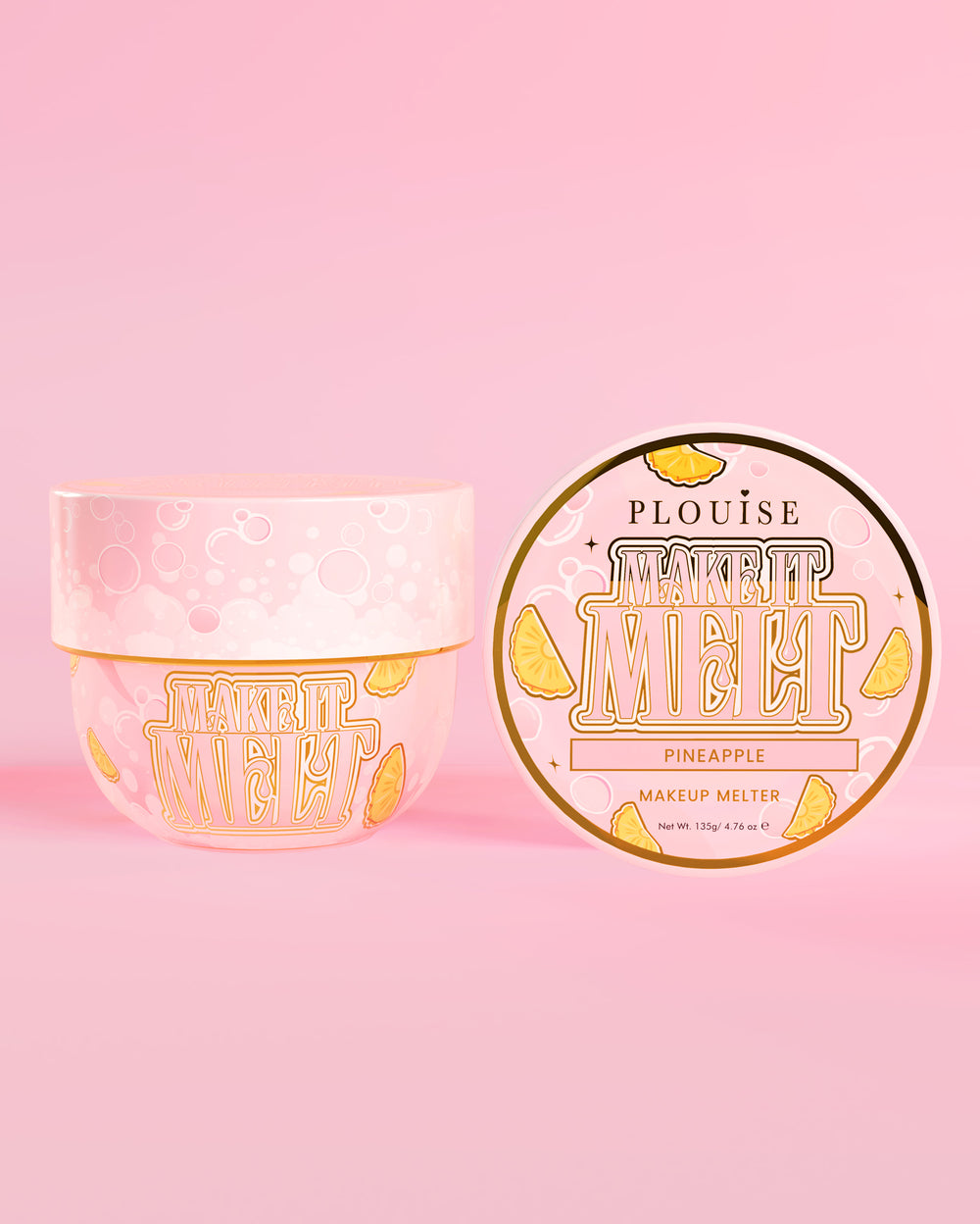Tub of P. Louise Make It Melt Makeup Cleansing Balm med ananassmag på en lyserød baggrund