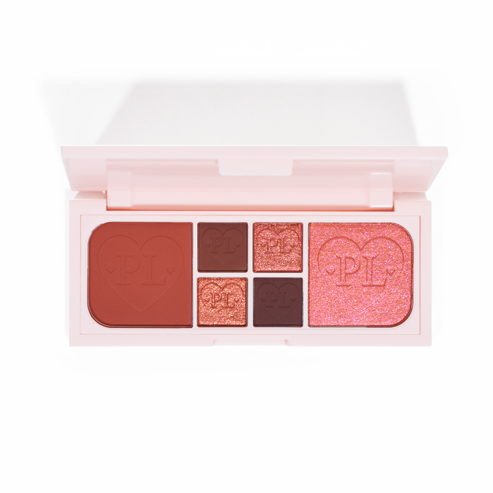 Et billede af P.Louise Fluffy Fantasy Mini Eyes & Face Palette med cremet matte og smøragtige shimmers i en række røde og mørkerosa nuancer